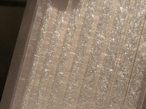 Pannello fonoisolante con microsfere