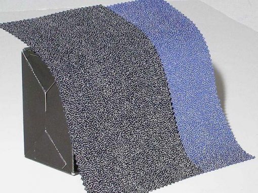 Tessuto riflettente con micro-particelle di vetro